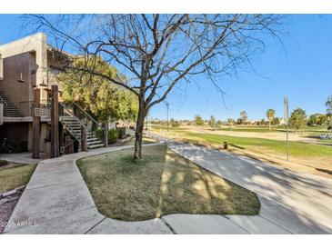 Condo with pathway to a scenic golf course at 7777 E Main St # 228, Scottsdale, AZ 85251