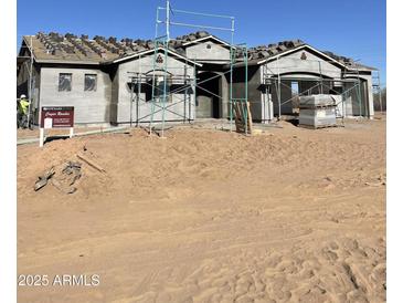 New construction home with tile roof, under construction at 21916 W Duane Ln, Wittmann, AZ 85361