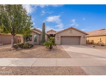 One-story home with a two-car garage and drought-tolerant landscaping at 2629 E Santa Maria Dr, Casa Grande, AZ 85194