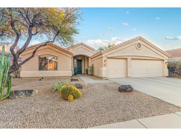 Single-story house with two-car garage and desert landscaping at 4611 E Red Bird Rd, Cave Creek, AZ 85331