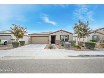 Single-story house with attached garage and landscaping at 20017 W Jackson St, Buckeye, AZ 85326