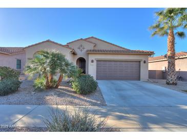 Single-story home with desert landscaping and a two-car garage at 2605 E San Thomas Dr, Casa Grande, AZ 85194