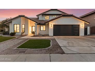 Stunning two-story home with modern design and landscaping at 16446 N 56Th Way, Scottsdale, AZ 85254