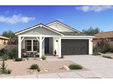 One-story home with gray siding, white trim, and a dark gray garage door at 16640 N Dante Way, Maricopa, AZ 85138