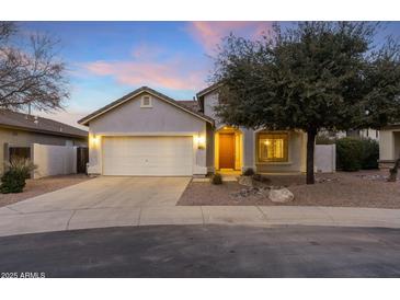 Nice curb appeal! One-story home with a two-car garage and landscaped front yard at 6497 S Twilight Ct, Gilbert, AZ 85298