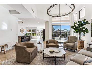 Bright living room with seating area and view of backyard at 7705 E Doubletree Ranch Rd # 55, Scottsdale, AZ 85258