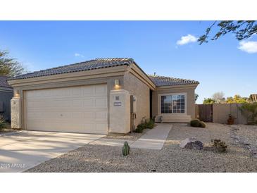 Single-story home with attached garage and desert landscaping at 30432 N 43Rd Pl, Cave Creek, AZ 85331