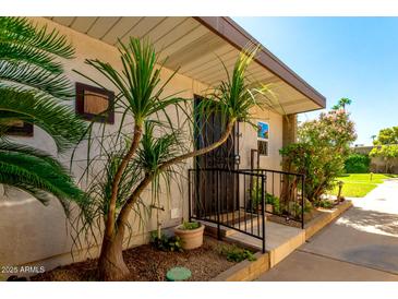 Inviting exterior with landscaping and a private entrance at 4800 N 68Th St # 264, Scottsdale, AZ 85251