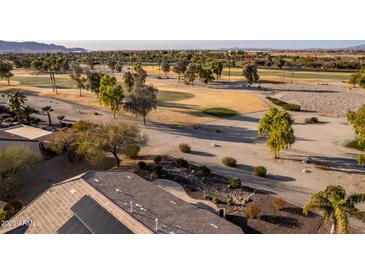 Aerial view of house, yard, and golf course at 4914 W Comanche Dr, Eloy, AZ 85131