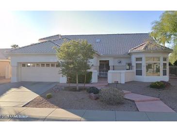 Charming single-story home with a spacious two car garage and well-maintained desert landscaping at 13811 W Via Tercero --, Sun City West, AZ 85375