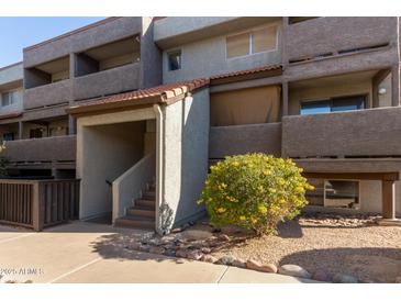 Attractive exterior of a two-story building with landscaping at 1645 W Baseline Rd # 2041, Mesa, AZ 85202