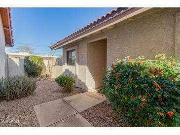 Inviting patio with gravel and drought-tolerant landscaping at 4135 N 17Th St # 8, Phoenix, AZ 85016