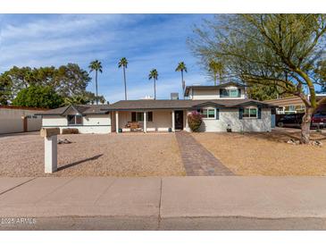 Single story home with a landscaped front yard and walkway at 2824 S Bala Dr, Tempe, AZ 85282