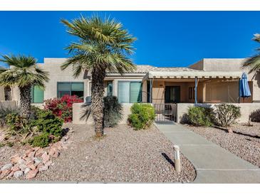 Inviting exterior with desert landscaping and covered patio at 14300 W Bell Rd # 480, Surprise, AZ 85374