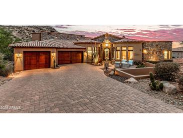 Stunning desert home with a large courtyard and 3-car garage at 14179 E Kalil Dr, Scottsdale, AZ 85259