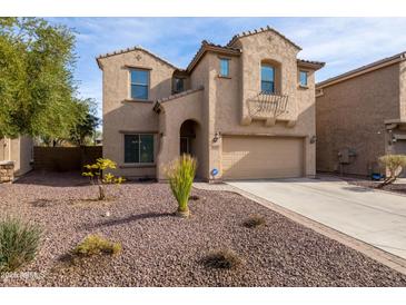 Two-story house with a two-car garage and landscaped front yard at 16225 N 22Nd Dr, Phoenix, AZ 85023