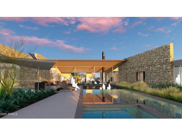 Stunning pool with integrated spa, fire feature, and stone architecture for sophisticated outdoor living at 5120 N Casa Blanca Dr, Paradise Valley, AZ 85253