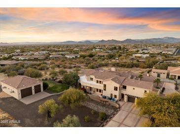 Two-story home with detached garage and desert landscaping at 31048 N 56Th St, Cave Creek, AZ 85331