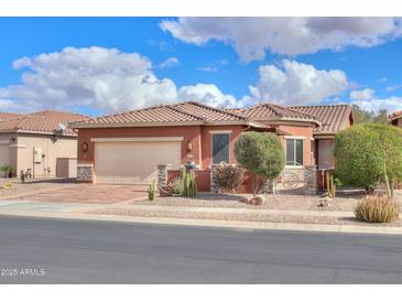 Single-story home with a two-car garage and desert landscaping at 22 S Mesilla Ln, Casa Grande, AZ 85194