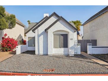 Cute starter home with a well-manicured front yard and neutral color scheme at 1535 N Horne -- # 105, Mesa, AZ 85203