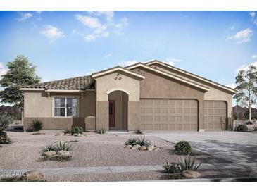 Single-story home with three-car garage and desert landscaping at 22693 E Happy Rd, Queen Creek, AZ 85142