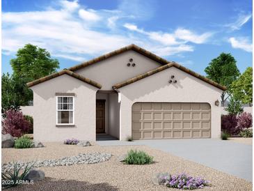 Single-story home with tan exterior, brown roof, and a two-car garage at 13165 E Verbina Ln, Florence, AZ 85132