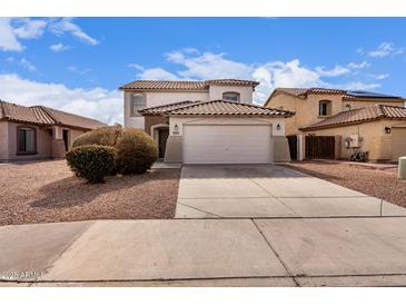 Two-story house with attached garage and desert landscaping at 43249 W Jeremy St, Maricopa, AZ 85138