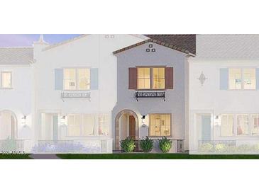 Modern two-story townhome with light-colored exterior and landscaping at 2658 S Sulley Dr # 103, Gilbert, AZ 85295