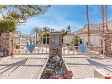 Gated entrance to Palm Cove community at 8270 N Hayden Rd # 1023, Scottsdale, AZ 85258