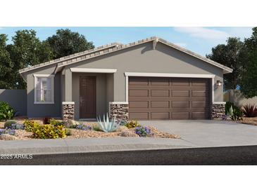 One-story home with brown garage door and stone accents at 17458 W Eva St, Waddell, AZ 85355