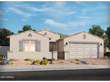 One-story home with a two-car garage and desert landscaping at 17673 W Southgate Ave, Goodyear, AZ 85338