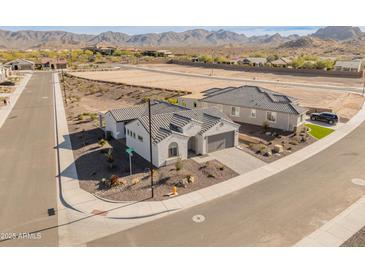 New home community with mountain views and desert landscaping at 18897 N 264Th Ln, Buckeye, AZ 85396