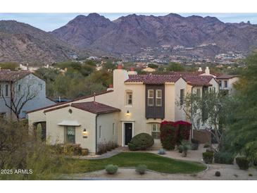 Stunning Spanish-style home with mountain views and manicured lawn at 20007 N 96Th Way, Scottsdale, AZ 85255