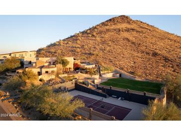 Luxury estate with tennis court, pool, and mountain views at 5113 W Arrowhead Lakes Dr, Glendale, AZ 85308