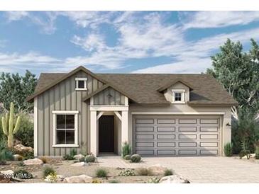 One-story home with craftsman style, light beige siding, and a two-car garage at 26128 S 228Th Pl, Queen Creek, AZ 85142