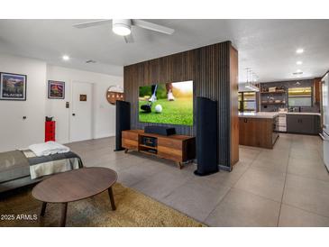 Open living area with modern furnishings and a view of the kitchen at 5820 N 83Rd St, Scottsdale, AZ 85250