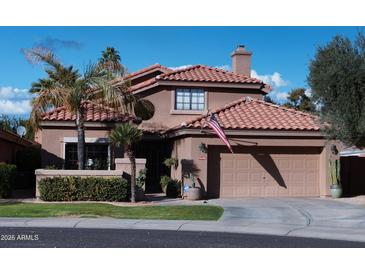 Beautiful two-story home with tile roof and landscaped yard at 15435 N 51St St, Scottsdale, AZ 85254