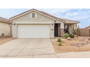 One-story house with a two-car garage and desert landscaping at 30130 N Jillian Dr, San Tan Valley, AZ 85143