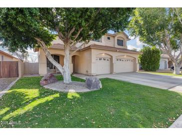 Two-story house with a landscaped front yard and two-car garage at 3639 E San Pedro Ave, Gilbert, AZ 85234