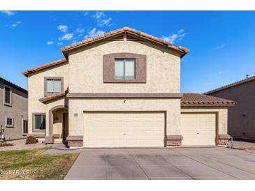 Two-story house with a large garage and well-maintained lawn at 4322 E Whitehall Dr, San Tan Valley, AZ 85140