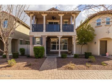 Two-story home with balcony and front yard landscaping at 1094 S Agnes Ln, Gilbert, AZ 85296