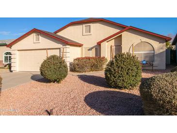 One-story house with a two-car garage and well-maintained landscaping at 4872 E Sandwick Dr, San Tan Valley, AZ 85140