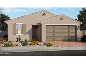 One-story home with neutral exterior, two-car garage, and landscaping at 3811 S 87Th Dr, Tolleson, AZ 85353