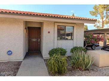 Attractive exterior of condo with landscaping and parking at 4135 N 17Th St # 11, Phoenix, AZ 85016
