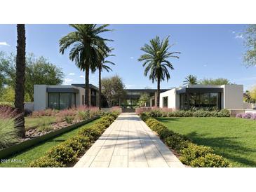 Modern home with palm trees and landscaped walkway at 6126 E Maverick Rd, Paradise Valley, AZ 85253