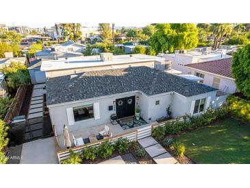 Aerial view of a charming house with a well-manicured lawn and modern design at 533 W Oregon Ave, Phoenix, AZ 85013