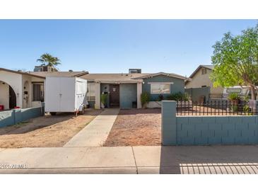 Cute ranch home with carport and small front yard at 4219 W Pasadena Ave, Phoenix, AZ 85019