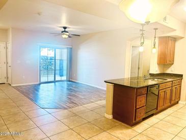 Modern kitchen with granite countertops and stainless steel appliances at 10136 E Southern Ave # 1110, Mesa, AZ 85209