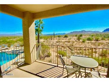 Stunning balcony view overlooking pool and desert landscape at 10401 N Saguaro Blvd # 213, Fountain Hills, AZ 85268