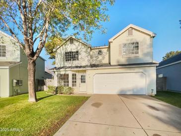 Two-story house with attached garage and landscaping at 441 S Maple -- # 123, Mesa, AZ 85206